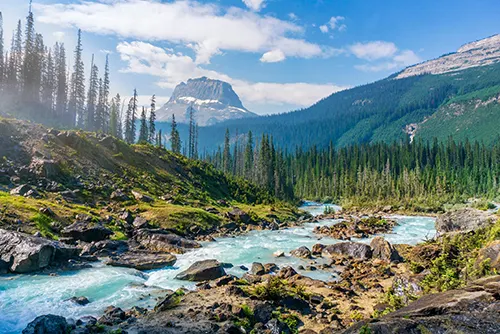 Glacier National Park tourism featuring rugged peaks, glaciers, and pristine wilderness