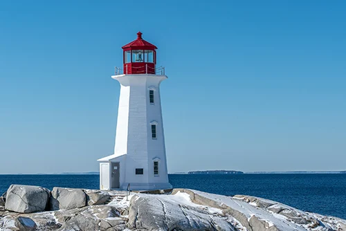 Peggy’s Cove tourism with iconic lighthouse, Atlantic coast, and fishing village charm