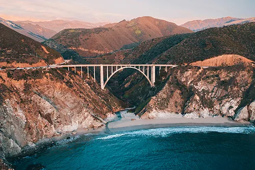 Big Sur tourism highlighting California’s coastal cliffs, ocean views, and scenic drives