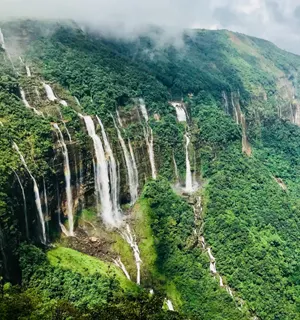 Explore waterfalls, caves, and living root bridges of Meghalaya