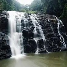Coorg hill holiday showcasing coffee plantations, misty landscapes, nature tourism, and relaxing travel
