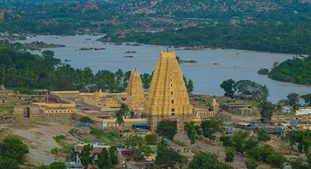Hampi heritage tourism highlighting ancient ruins, temples, history, and cultural travel