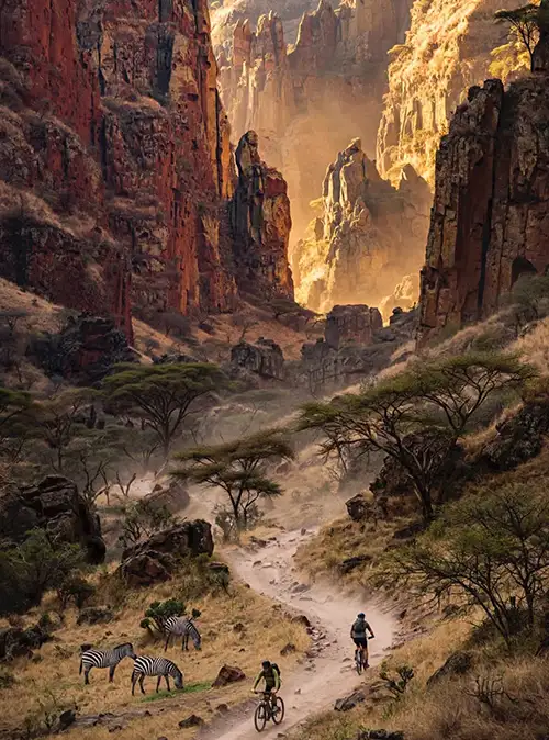 Hell’s Gate National Park adventure travel featuring dramatic cliffs, cycling trails, and wildlife