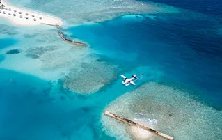 Maldives holiday package with Coco Bodu Hithi luxury island getaway