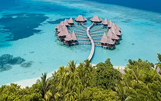 Luxury Maldives holiday package featuring Villa Nautica beachfront island retreat