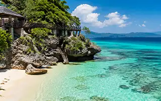 Philippines travel package highlighting whale sharks, volcano views, and nature
