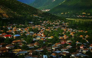Azerbaijan tourism showcasing Sheki heritage, Baku highlights, and Caucasus highlands