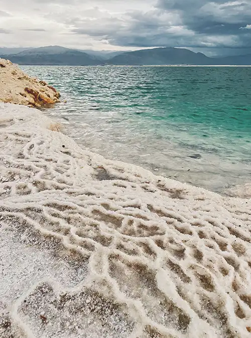 Travel guide featuring Jordan's Dead Sea scenic shoreline and wellness destination attractions.