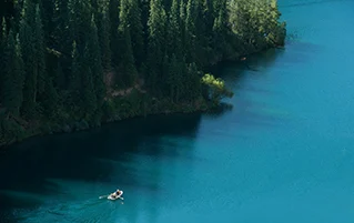 Kazakhstan mountain tour featuring alpine lakes and dramatic canyons for unforgettable holiday travel experiences.