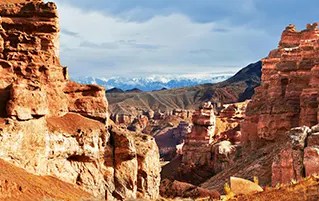 Kazakhstan travel tour featuring alpine scenery, breathtaking canyons, and rich cultural heritage throughout the journey.