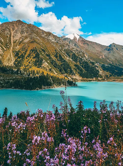 Holiday travel through Kazakhstan's breathtaking valleys, steppes, peaks, and lakes