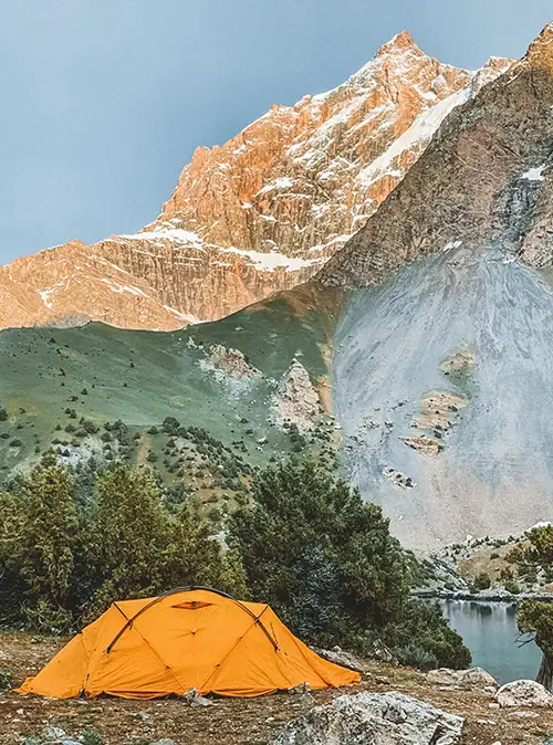 Adventure tour featuring camp stay experiences in Tajikistan's mountain wilderness