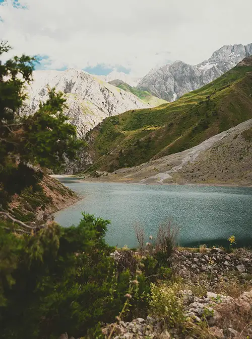 Travel guide showcasing Uzbekistan's stunning mountains deserts valleys and natural wonders.