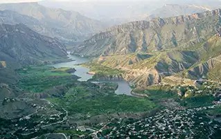 Uzbekistan Silk Road tour covering Tashkent, Bukhara, Samarkand with scenic Chimgan Mountain landscapes.