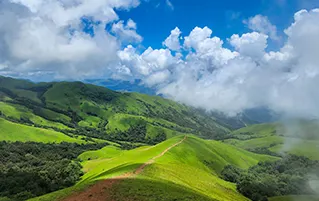 Karnataka nature travel tour through Chikmagalur hills and Kudremukh scenic landscapes