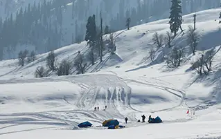 Scenic Srinagar to Gulmarg travel tour showcasing mountains and snowy landscapes in Kashmir
