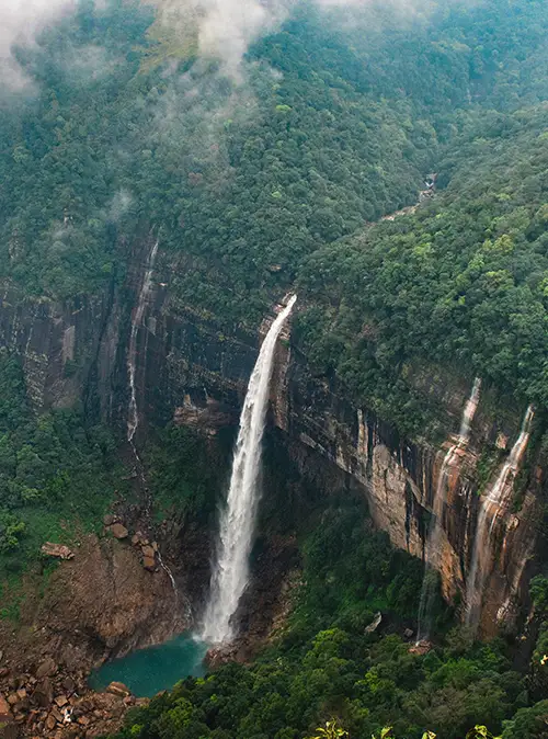 Popular Meghalaya attractions including waterfalls caves and scenic landscapes for travel tours