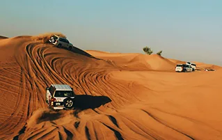 Dubai luxury holiday tour with Burj Khalifa, desert safari, and Atlantis adventure attractions.