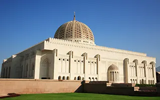Oman heritage tour exploring ancient forts, mountain scenery, and desert travel adventures across Oman.