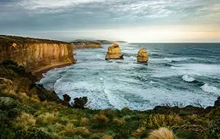 Australia tour package banner featuring Great Barrier Reef, Gold Coast and theme parks